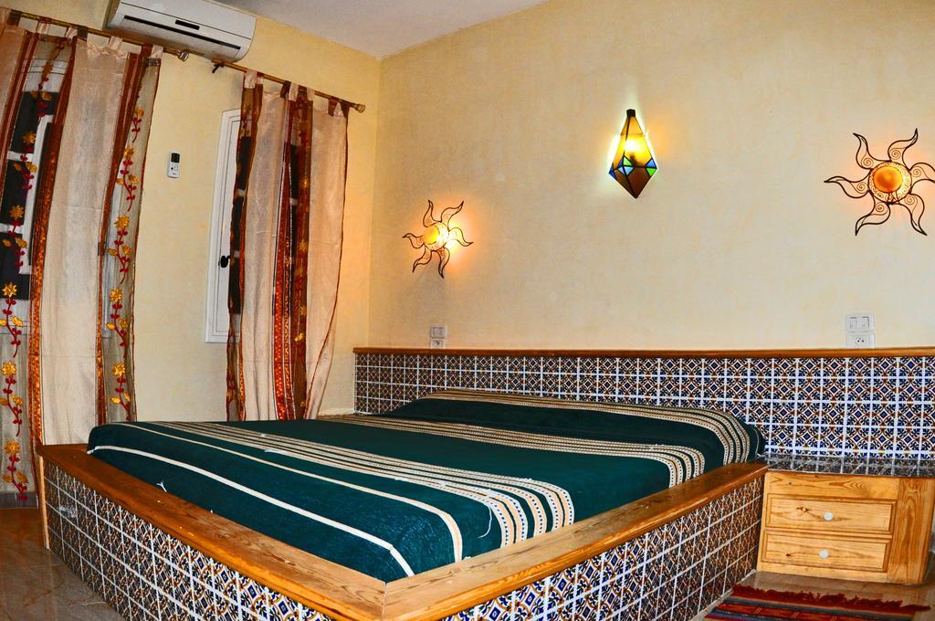 Residence Loued Tozeur Quarto foto